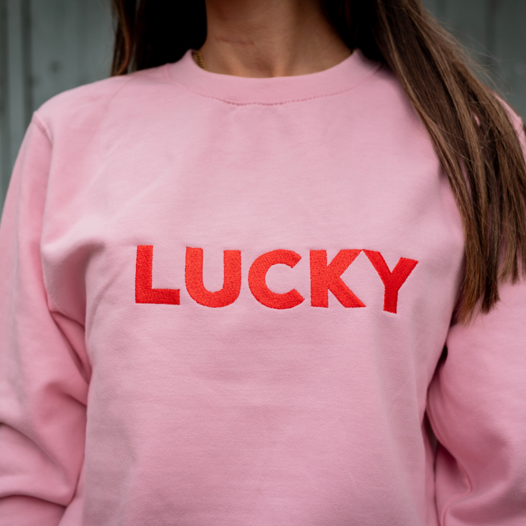 Pink slogan sweatshirt hotsell