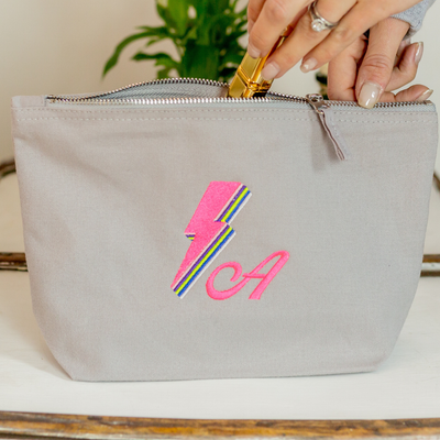 Personalised Grey Pouch With Neon Pink Embroidered Lightning Bolt and Initial