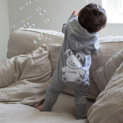 Our Personalised Hooded Onesie is a grey romper suit a gorgeous design on the reverse, personalised with your baby's name.